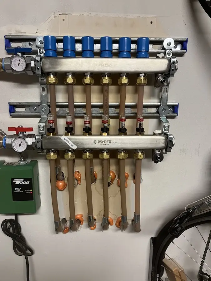 Plumber performing Water Heater Repair at a residential property in Georges